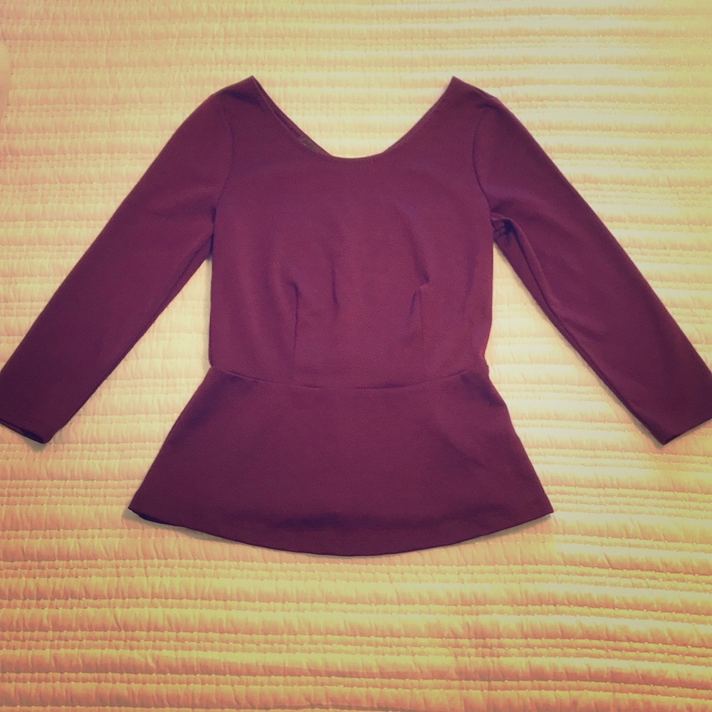 Burgundy scoop neck peplum top with v-neck back